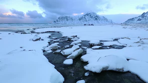 Creek on the Winter Lofoten Beach