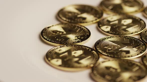 Rotating shot of Bitcoins (digital cryptocurrency) - MONERO