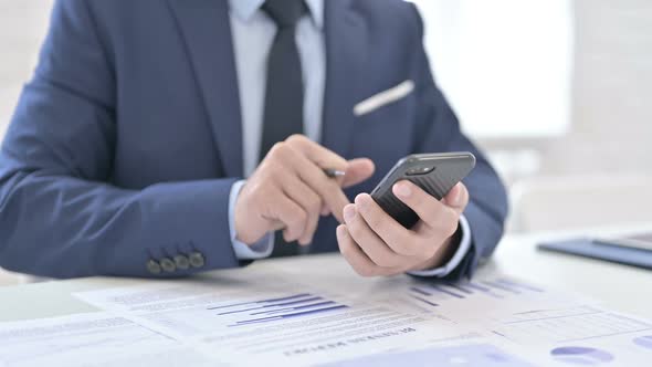 Businessman Using Smartphone Close Up