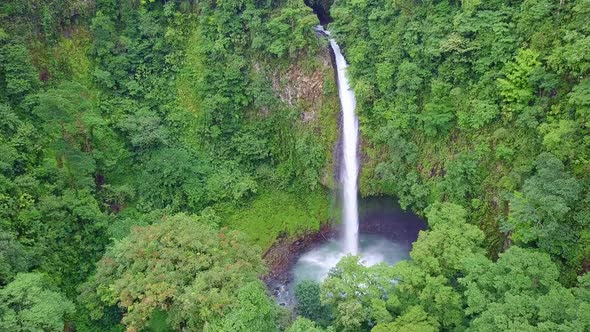 La Fortuna Waterfall in Arenal Volcano National Park, Costa Rica, AERIAL PUSH