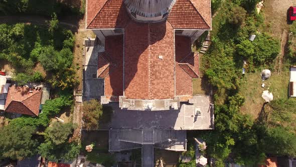 Drone View of the Cruciform Tiled Roof of the Church in Prcanj