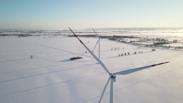 Bird's Eye View Of Wind Turbines On The Farm Fields Of Northern Poland - aerial drone shot