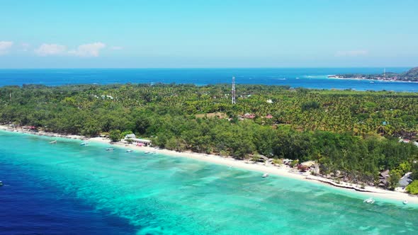 Aerial above abstract of idyllic tourist beach time by blue water with white sand background of adve