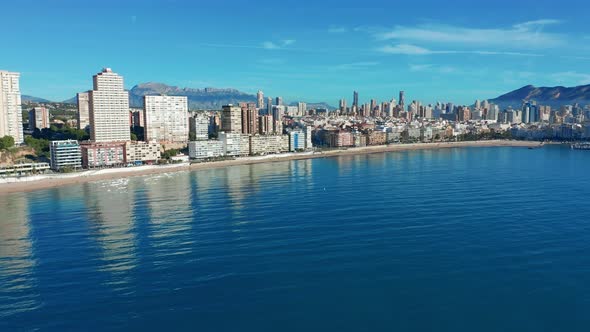 Aerial Footage of Benidorm Playa Levante Beach, Hotels, Buildings, Restaurants and the Coastline