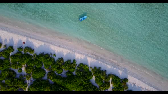 Aerial top view seascape of tranquil sea view beach trip by blue green ocean and white sandy backgro
