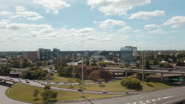 Aerial shot rising over Panamericana highway and General Paz Avenue in Buenos Aires