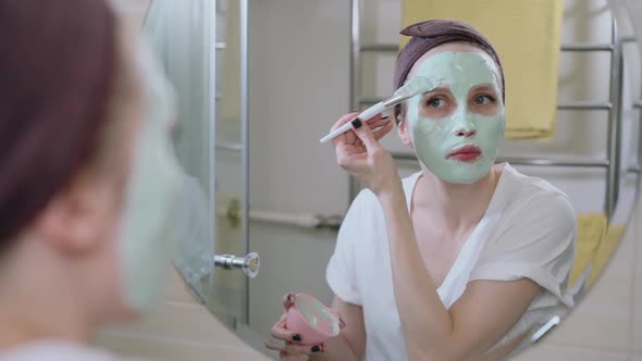 Beautiful Woman Apply Clay Mask on Her Face Spbas