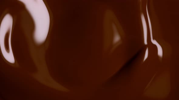 Super Slow Motion Shot of Swirling Chocolate Background at 1000Fps