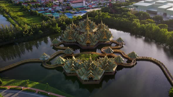 Epic Fly in of a breath taking Temple on a lake at dawn Ancient City Siam, Bangkok, Thailand