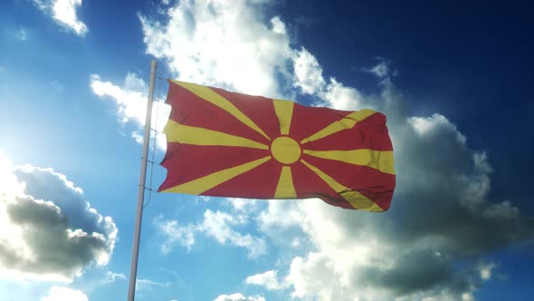 Flag of Macedonia Waving at Wind Against Beautiful Blue Sky