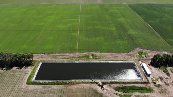 Aero. Top View. Man-made Special, Water Storage Pool, Tank or Reservoir for Agricultural Fields