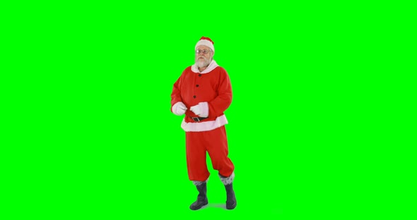 Santa claus dancing against green background 4k