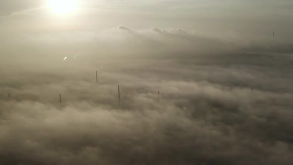 Flying Over the Evening Clouds with the Late Sun.