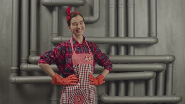 Motivated Housekeeper Woman with Hands on Waist