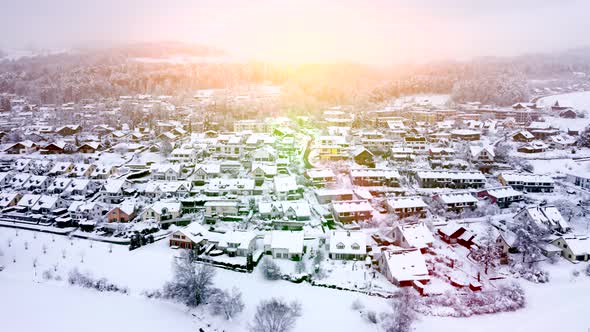 Overlooking Urban Homes on a Cold Winter Day at Sunset