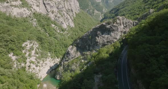 aerial view of canyon and mountains, river blue water