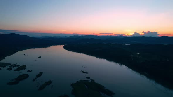 4K Flight Through Landscape River. Sunset landscape