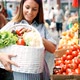 Picture of Woman at Marketplace Buying Vegetables - VideoHive Item for Sale
