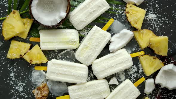 Summer Popsicles on Stick. Pinacolada Flavour. Made with Pineapple, Cocount Milk, Rum. Vegan Snack