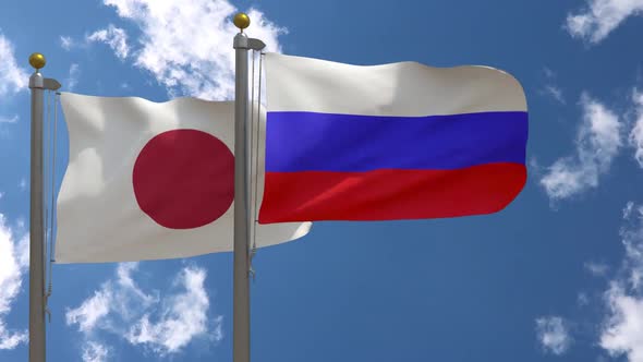 Japan Flag Vs Russia Flag On Flagpole