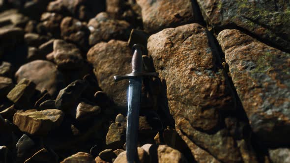 Old Dagger on the Rock at Sunset