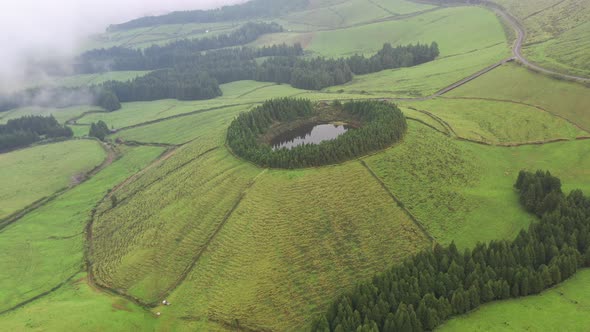 Aerial view of a small lake on hilltop near Capelas, Azores Islands, Portugal.