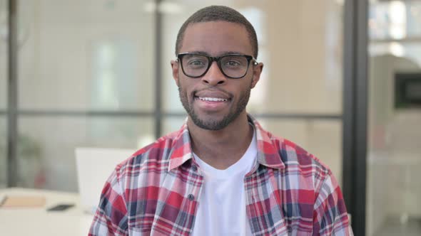 Portrait of Attractive African Man Smiling at Camera