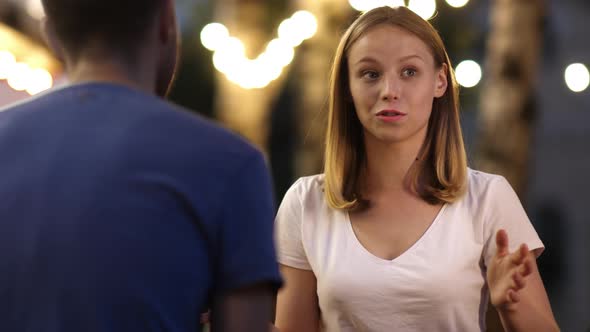 Emotional Teen Girl Telling a Story on a Date.