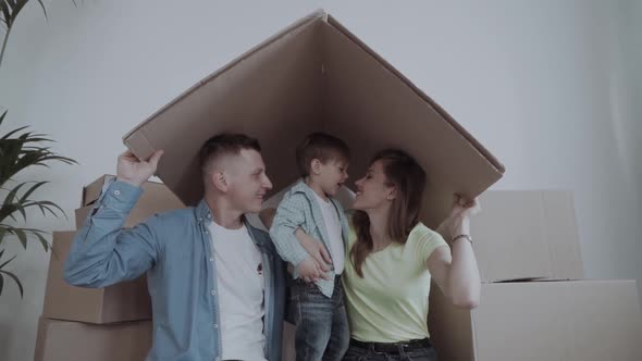 A Happy Family Moves To a New Apartment.