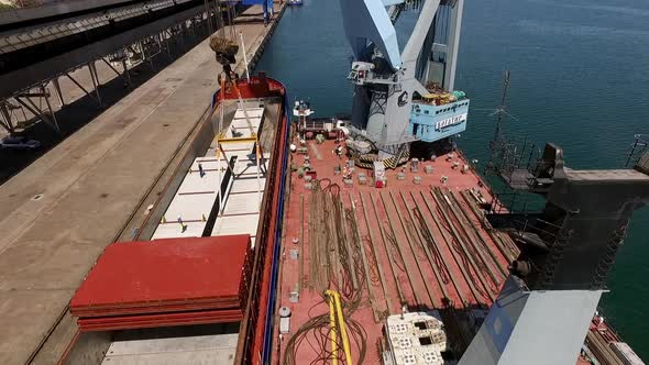 Ukraine  May 2016 Aerial View of Oversized Cargo Reloading From Ship to Pontoone Crane