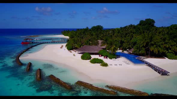 Aerial drone tourism of exotic island beach adventure by shallow water and white sandy background of