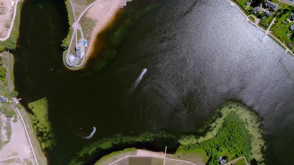 Aerial Top View of Blue Lakes with Islands and Green Forests in Latvia