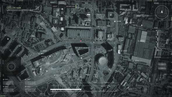 Interface of a spying drone examining the designated area above the city center alt