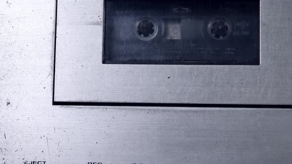 Audio cassette with retro tape player.