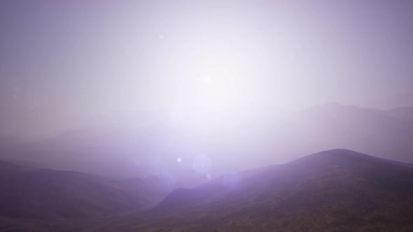 Aerial Green Hills Landscape in Fog