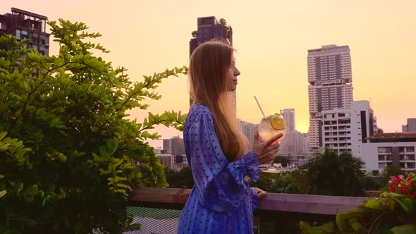 Woman in Elegant Evening Dress Hold Nonalcoholic Cocktail Rooftop Bar Terrace