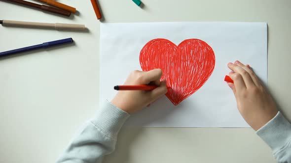 Child Painting Big Red Heart