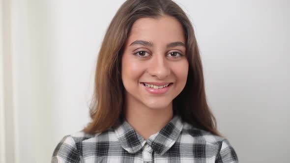 Portrait of a smiling mixed race girl.