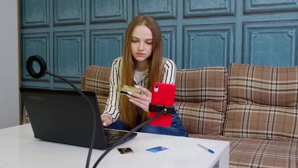 Woman Ordering Food Making Shopping Payments Purchases From Bank Credit Card on Laptop Computer