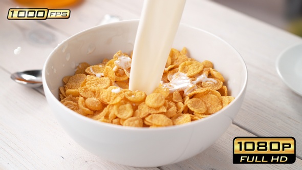 Pouring Milk into Bowl of Cornflakes