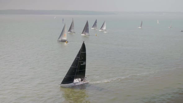 Yachts Competing in a Fast 40 Sailing Race