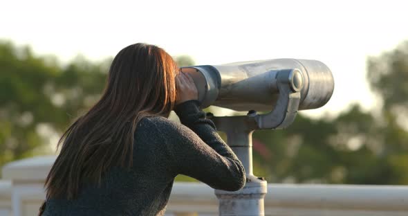 Travel Woman Look Tough the Binocular at Outdoor