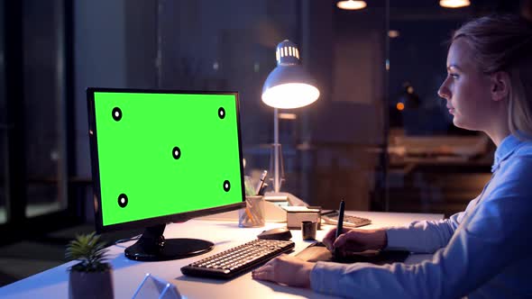 Graphic Designer with Green Screen on Computer 30