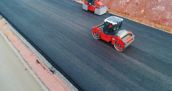 The Road Roller is Laying Asphalt