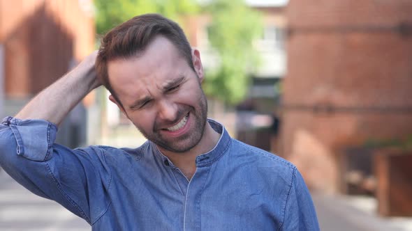 Headache Portrait of Tense Casual Man in Office