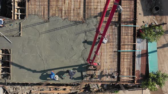 Aerial View Of A Construction Site During Pouring Cement