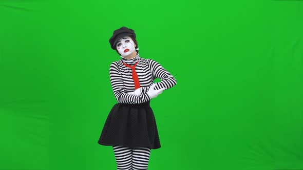 Mime Girl Is Shaking a Baby, Looking Exhausted