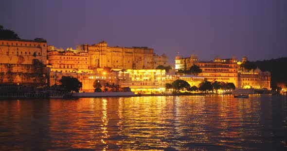 Udaipur City Palace and Lal Ghat on Bank of Lake Pichola with Water Ripples - Rajput Architecture of