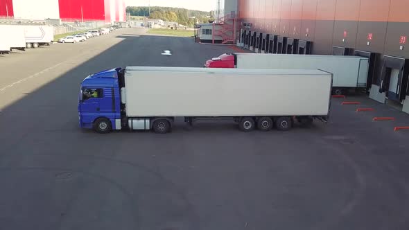 Truck Are Parking To Dock of Logistics Center
