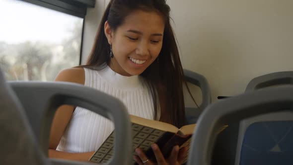 Teenage girl reading a book 4k